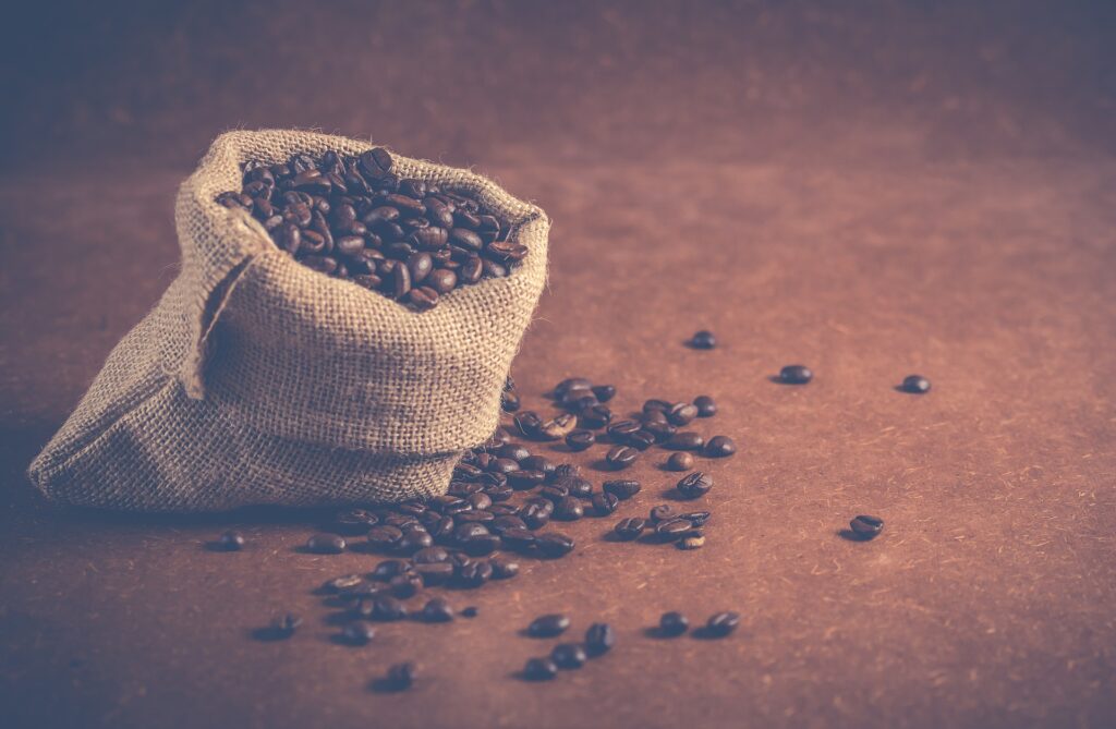 coffee beans spilled from a bag